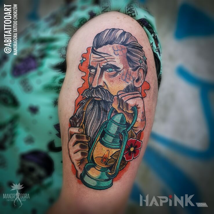 Tattoo Latarnik in objects motif and neo-traditional style on the upper arm