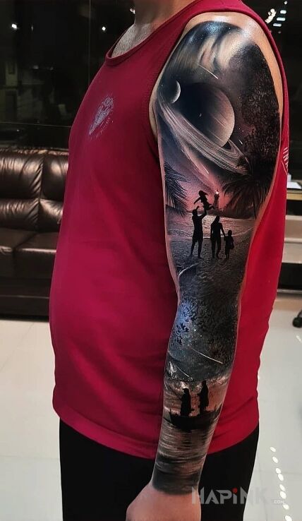Tattoo Mamy kosmos in characters motif and realistic style on the forearm