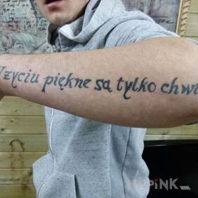 Tattoo In life, only moments are beautiful on the forearm motif: lettering
