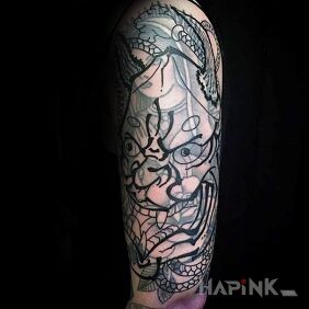 Tattoo Head of a Japanese demon on the upper arm motif: demons style: blast over