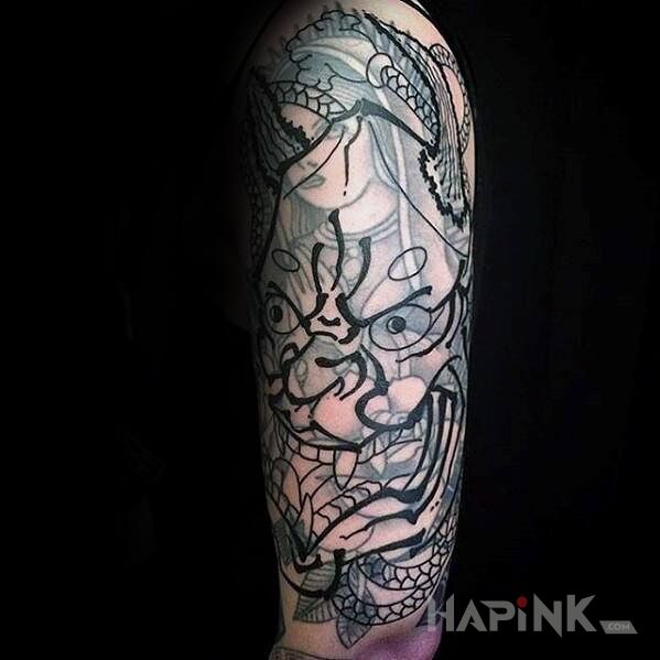 Tattoo Łeb japońskiego demona in demons motif and contour / linework style on the upper arm