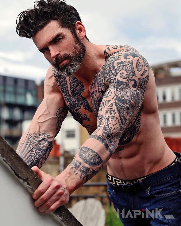 Tattoo Przystojny facio in black and gray motif and Celtic / Nordic style on the forearm