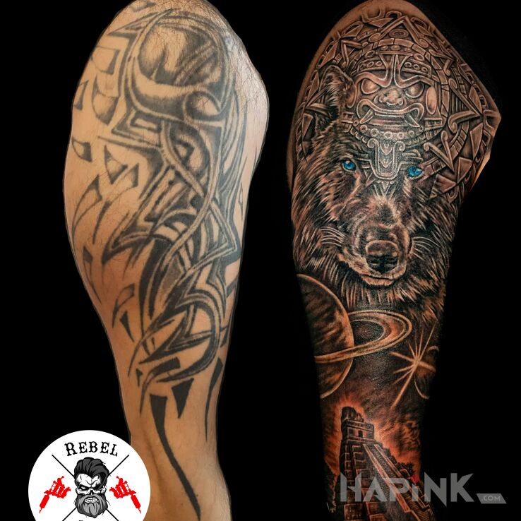 Tattoo Cover in cover-up motif and realistic style on the upper arm