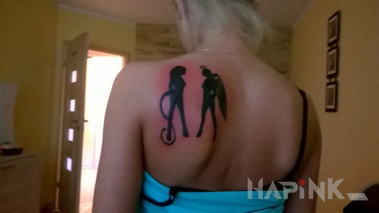 Tattoo Taka jestem  in demons motif on the shoulder blades