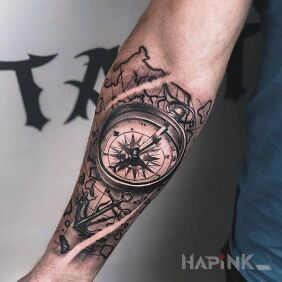 Tattoo Compass on the forearm motif: black and gray style: realistic