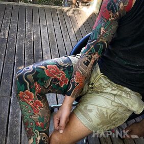 Tattoo Half and half 😀 on the thigh motif: floral style: japanese / irezumi