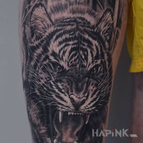 Tattoo Tiger on the leg motif: animals