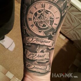 Tattoo Clock on the forearm motif: objects