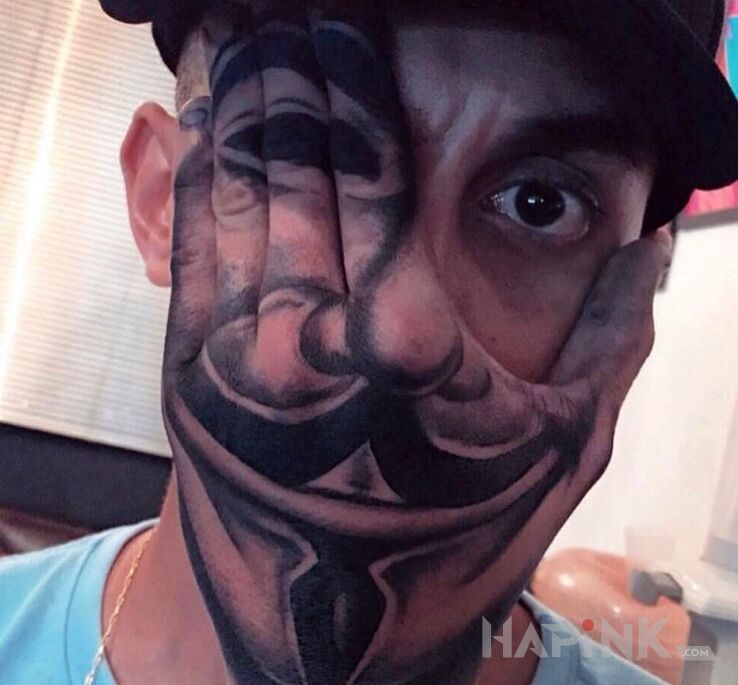 Tattoo Maseczka 😄 in black and gray motif and graphic / illustrative style on the hand