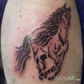 Tattoo Kon on the upper arm motif: Indian style: tribal