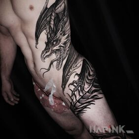 Tattoo Big, really big dragon on the thigh motif: black and gray style: graphic / illustrative
