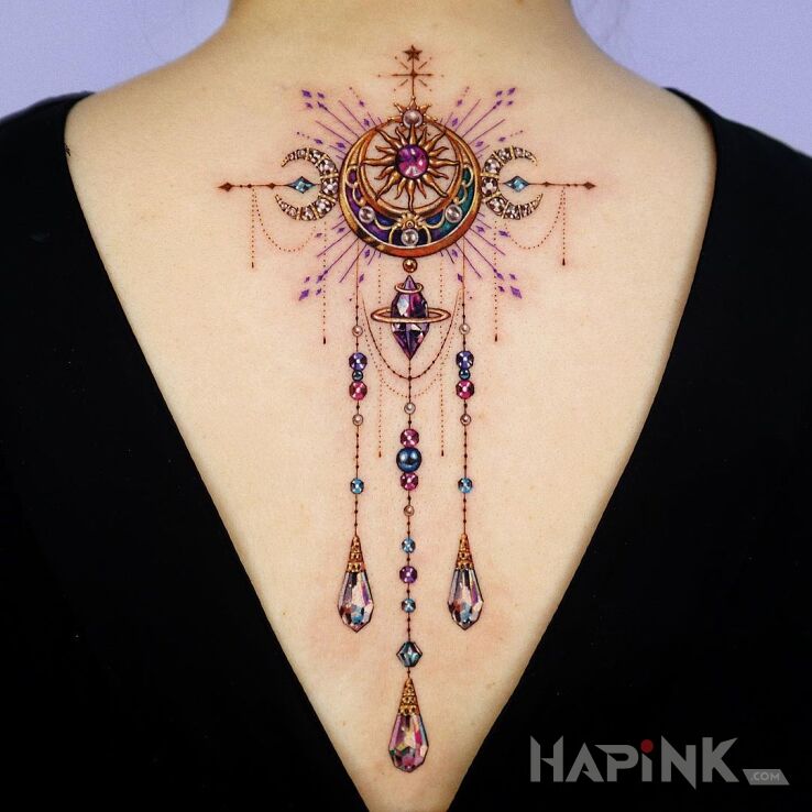 Tattoo Błyskotki in objects motif and graphic / illustrative style on the back
