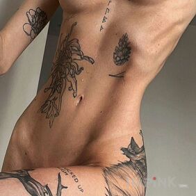 Tattoo Nice body with tattoos on the hip motif: black and gray style: graphic / illustrative