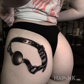 Tattoo Gag on the buttocks motif: black and gray style: realistic