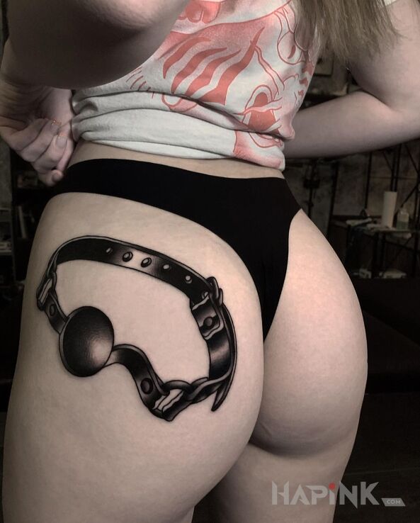 Tattoo Knebel in black and gray motif and realistic style on the buttocks