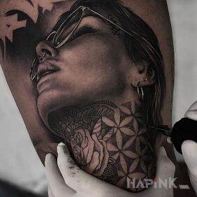 Tattoo Tattooing a tattoo with a tattoo 🤯 on the leg motif: faces style: realistic