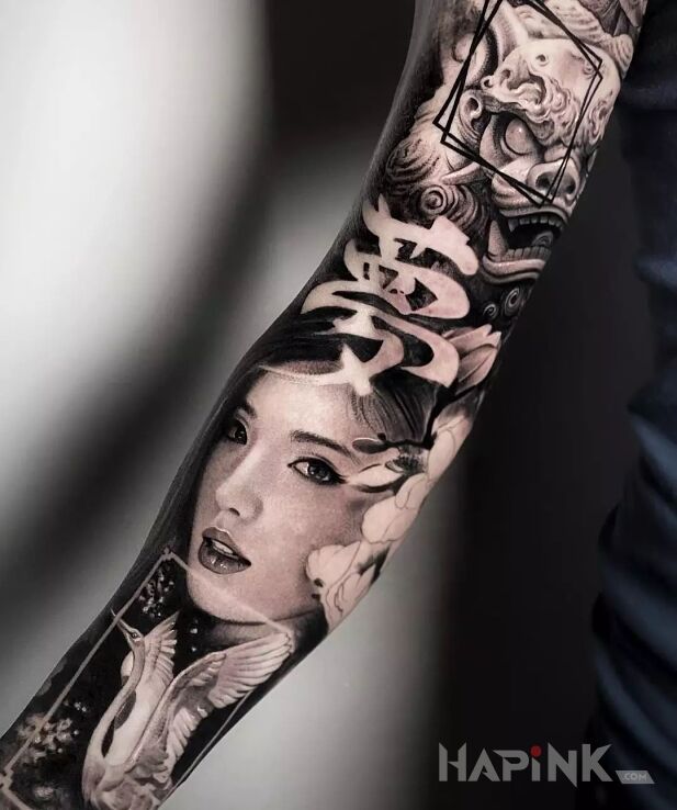 Tattoo Japońska buźka in faces motif and realistic style on the bicep