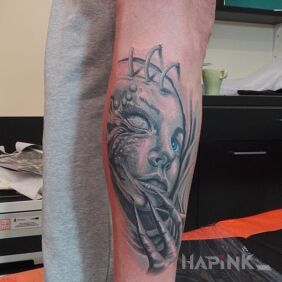 Tattoo Such as on the calf motif: faces