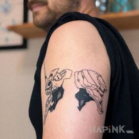 Tattoo Evangelion on the upper arm motif: black and gray style: graphic / illustrative
