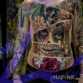 Tattoo Santa muerte on the stomach motif: flowers style: realistic