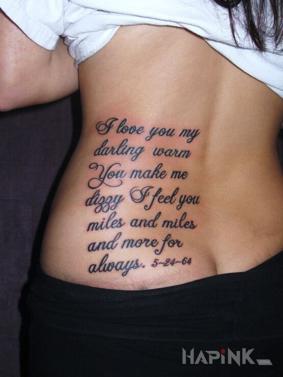 Tattoo Miłosny przekaz in lettering motif and calligraphy style on the back