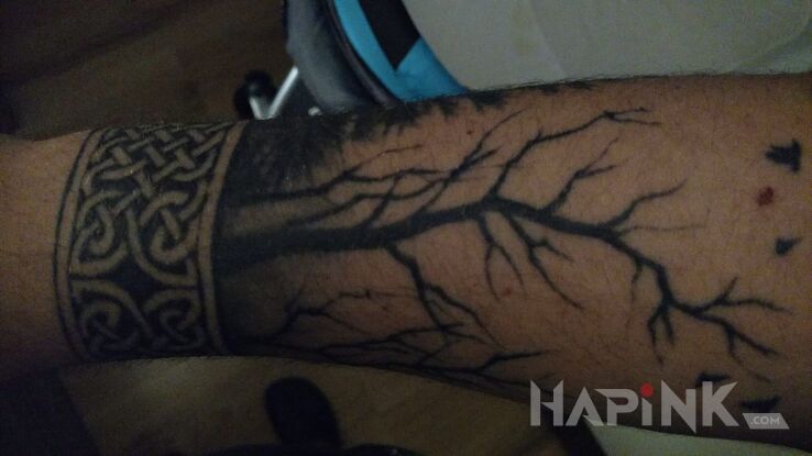Tattoo Wikingowska bransoleta z lasem in other motif on the forearm
