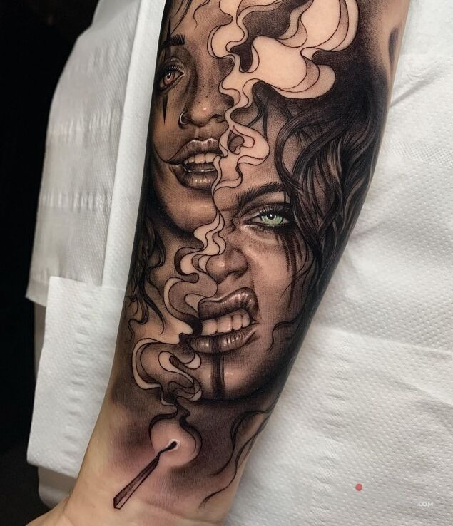 Tattoo Dwa oblicza in faces motif and realistic style on the forearm