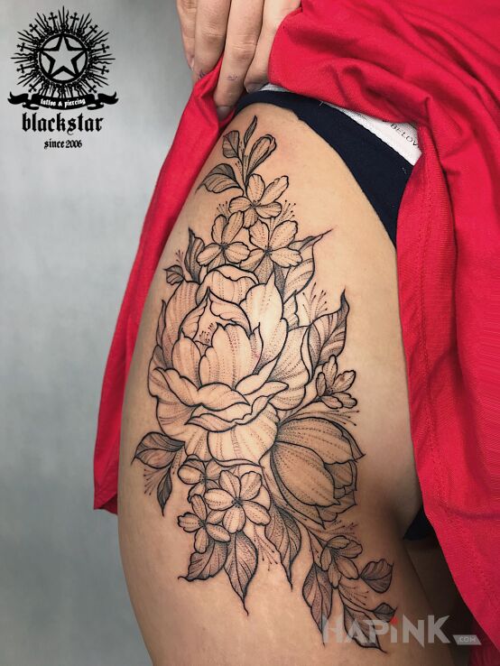 Tattoo Kwiaty na biodrze. in flowers motif and graphic / illustrative style on the hip