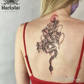 Tattoo Dragon on the back. on the back motif: dragons style: graphic / illustrative
