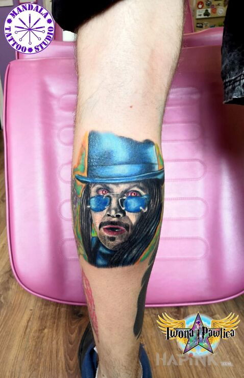 Tattoo Dracula in characters motif and realistic style on the leg