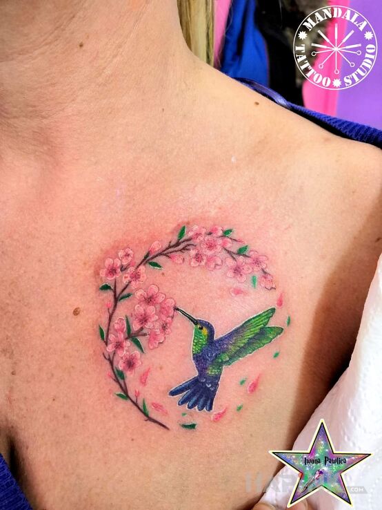 Tattoo Koliber in animals motif and realistic style on the chest