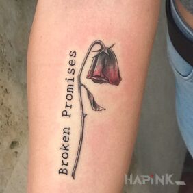 Tattoo Broken promises on the forearm motif: flowers style: graphic / illustrative