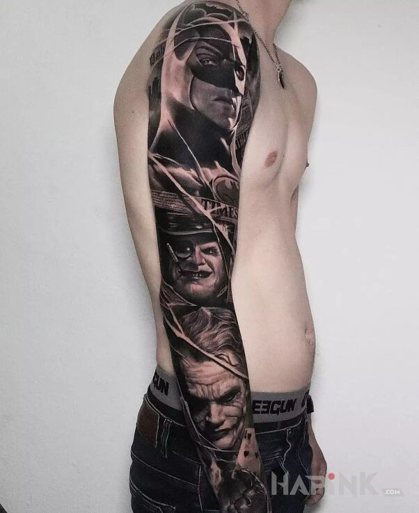 Tattoo Batman Tima Burtona in faces motif and realistic style On the arm