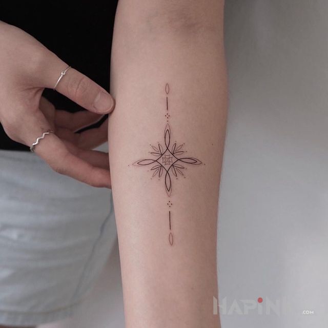 Tattoo Małe coś in other motif and minimalistic style On the arm