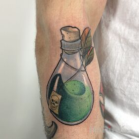Tattoo Bottle On the arm motif: colorful style: graphic / illustrative