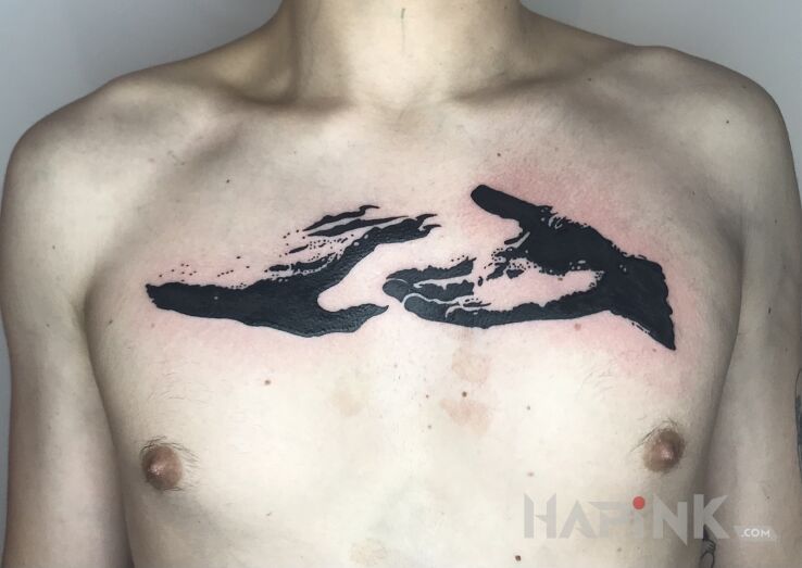 Tattoo Stworzenie in religious motif and blackwork / blackout style on the chest