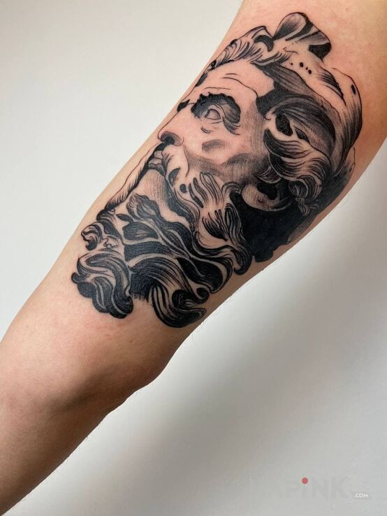 Tattoo Dawid in black and gray motif and graphic / illustrative style On the arm
