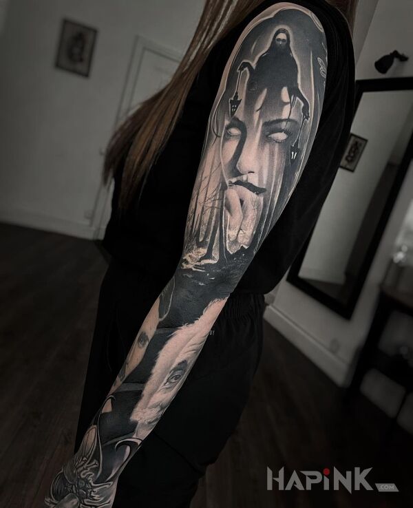 Tattoo Upiór in faces motif and realistic style On the arm