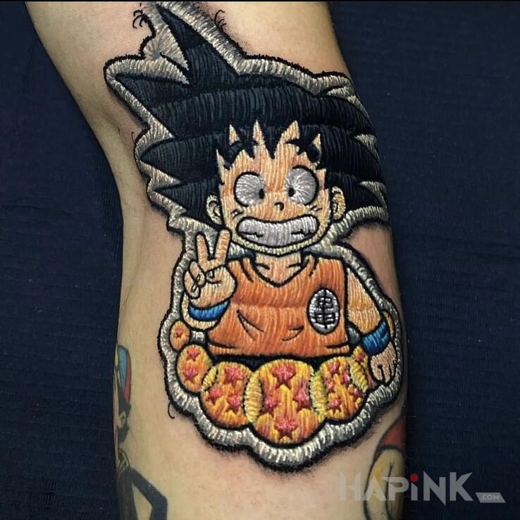 Tattoo Naszywka z songo in colorful motif and embroidered style on the forearm
