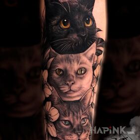 Tattoo Cats on the forearm motif: animals style: realistic