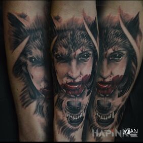 Tattoo Female Wolf on the forearm motif: faces