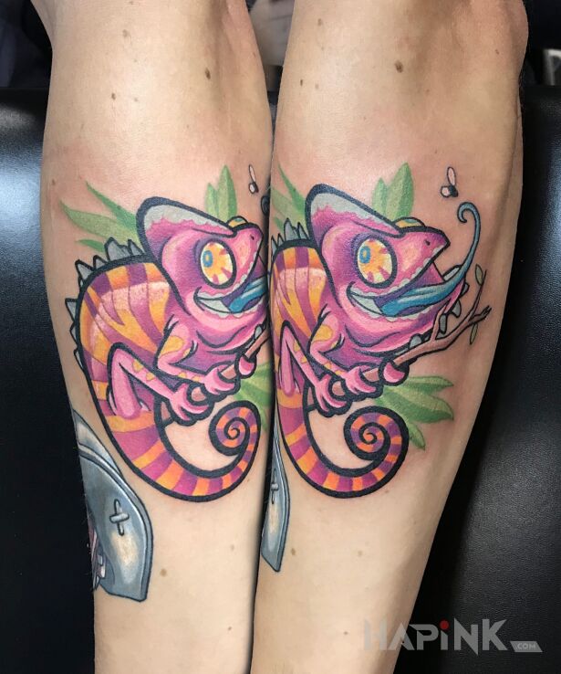 Tattoo Kameleon in colorful motif and newschool style on the forearm