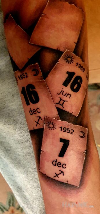 Tattoo Kalendarz in other motif and realistic style on the forearm