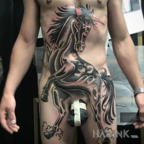Tattoo Stallion on the thigh motif: black and gray style: graphic / illustrative