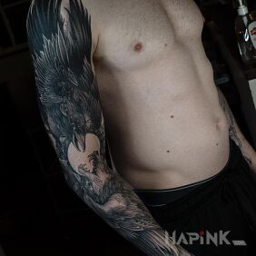 Tattoo Raven fighting with a wolf On the arm motif: sleeves style: graphic / illustrative