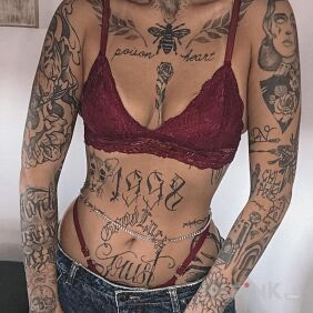 Tattoo Nicely inked between the breasts motif: skulls style: graphic / illustrative