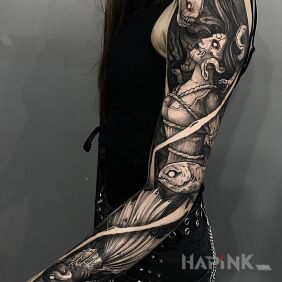 Tattoo Caught by Eels on the forearm motif: black and gray style: graphic / illustrative
