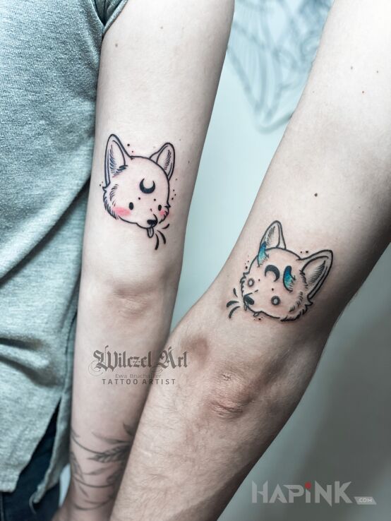 Tattoo Kotek / Kotki in black and gray motif and graphic / illustrative style On the arm