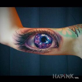 Tattoo Space in the eye on the upper arm motif: 3D