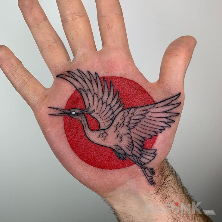Tattoo Czapla siwa in colorful motif and graphic / illustrative style on the hand